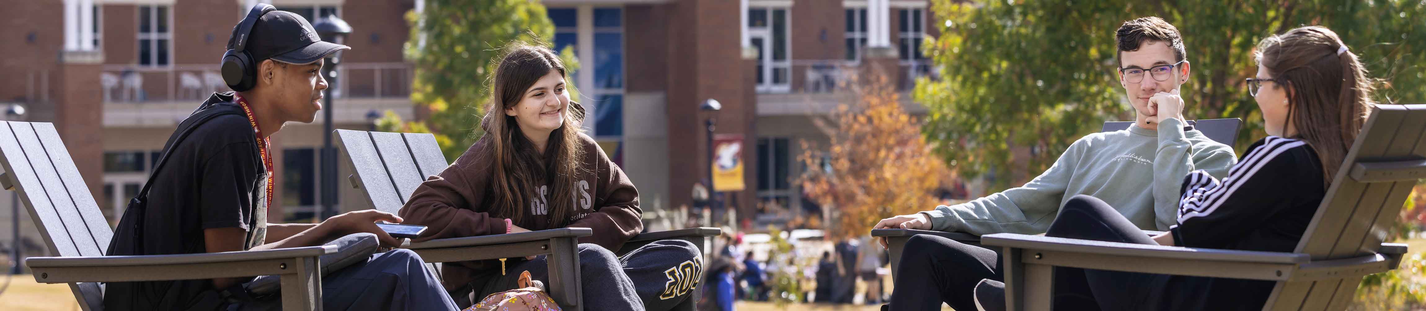 students sitting outside 