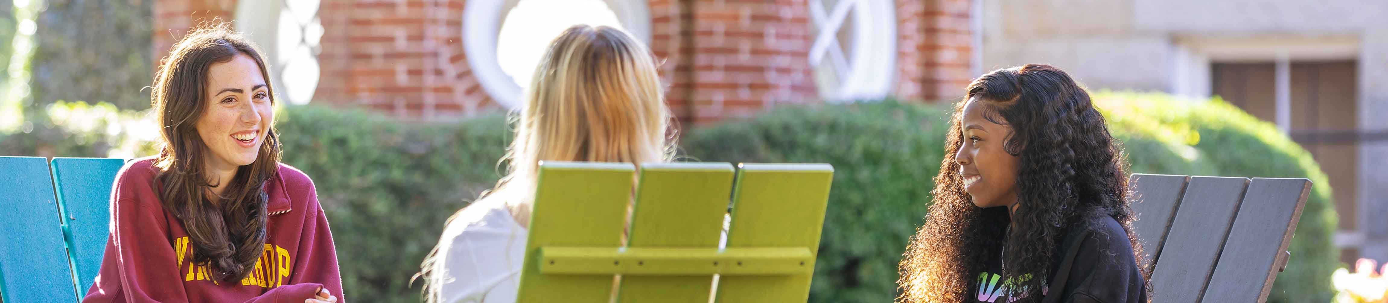 students sitting outside