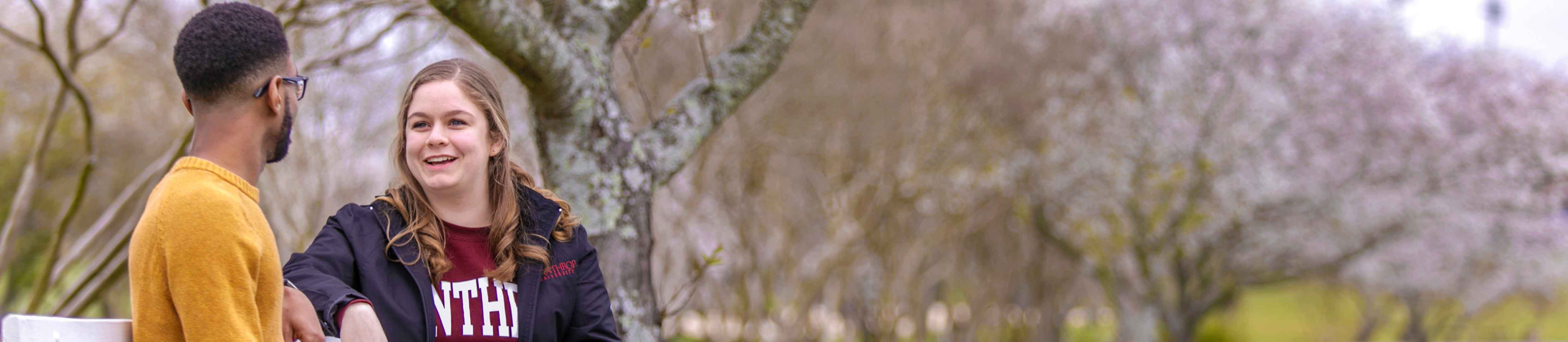 students sitting outside 